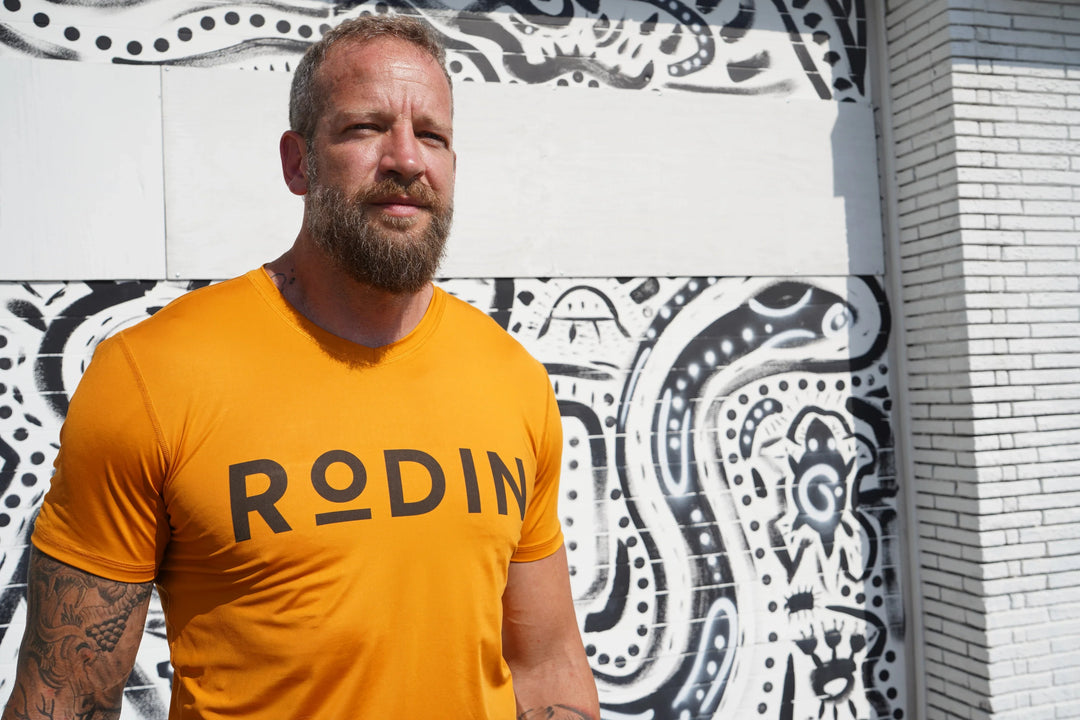 Man wearing RODIN shirt