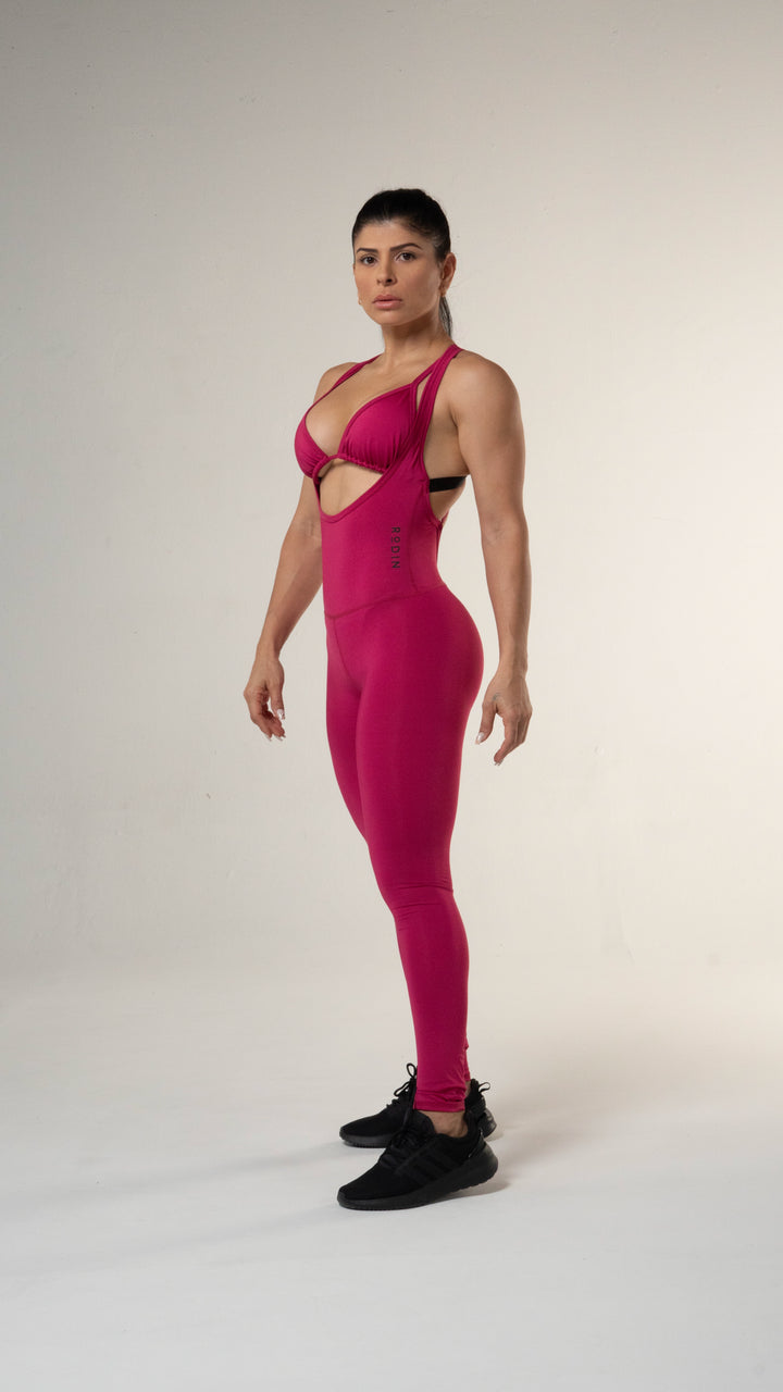 Woman wearing the Luna long bodysuit of medium compression and color magenta#color_sangria