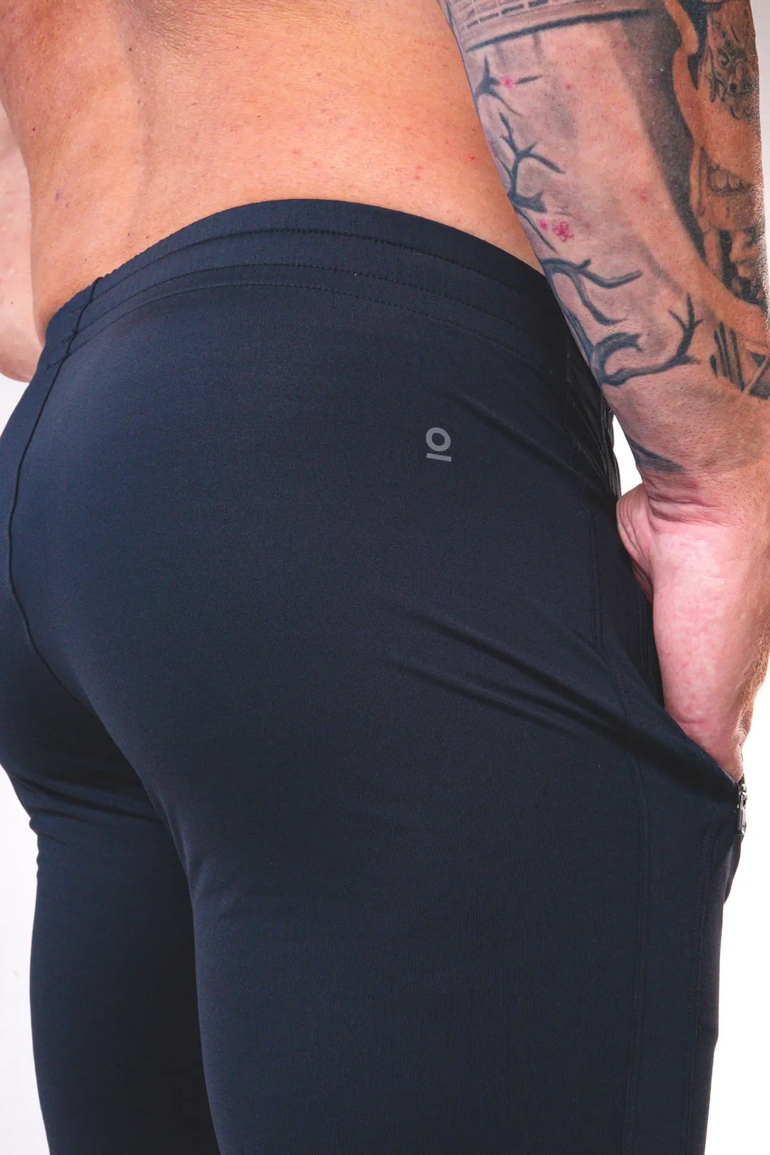 Man wearing the Rogan functional athlete jogger of color black#color_black