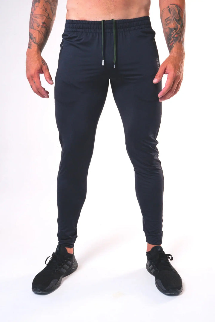 Man wearing the Rogan functional athlete jogger of color black#color_black