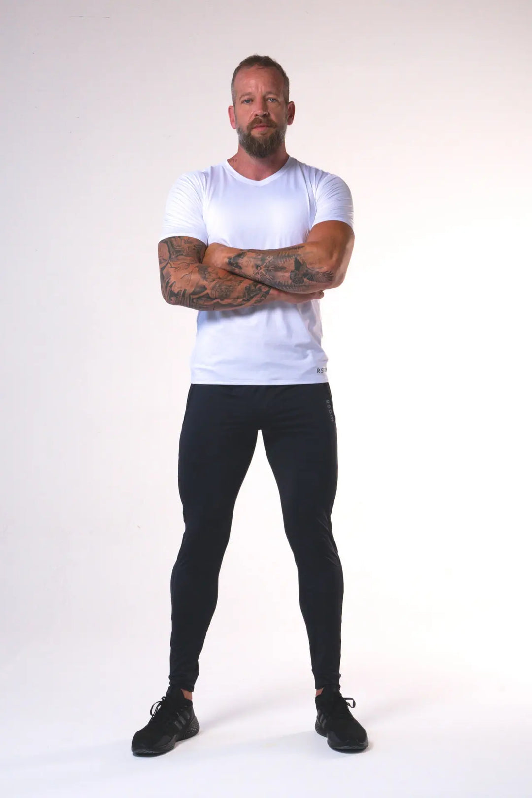 Man wearing the Rogan functional athlete jogger of color black#color_black